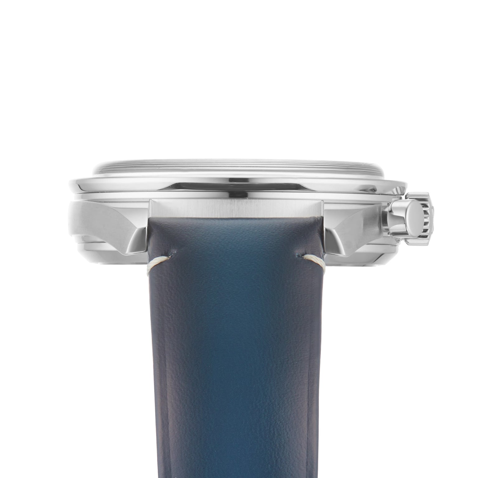 Side view of the OMEGA Speedmaster 57 with a stainless steel case and blue leather strap, featuring visible crown, detailed stitching on the strap, and a subtle tachymeter scale on the bezel.