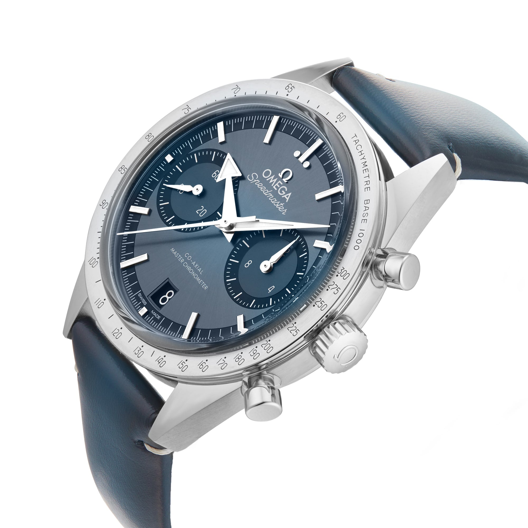 An OMEGA Speedmaster 57 wristwatch in stainless steel, featuring a blue dial with two subdials, date window, tachymeter bezel, and blue leather strap, displayed at an angle.
