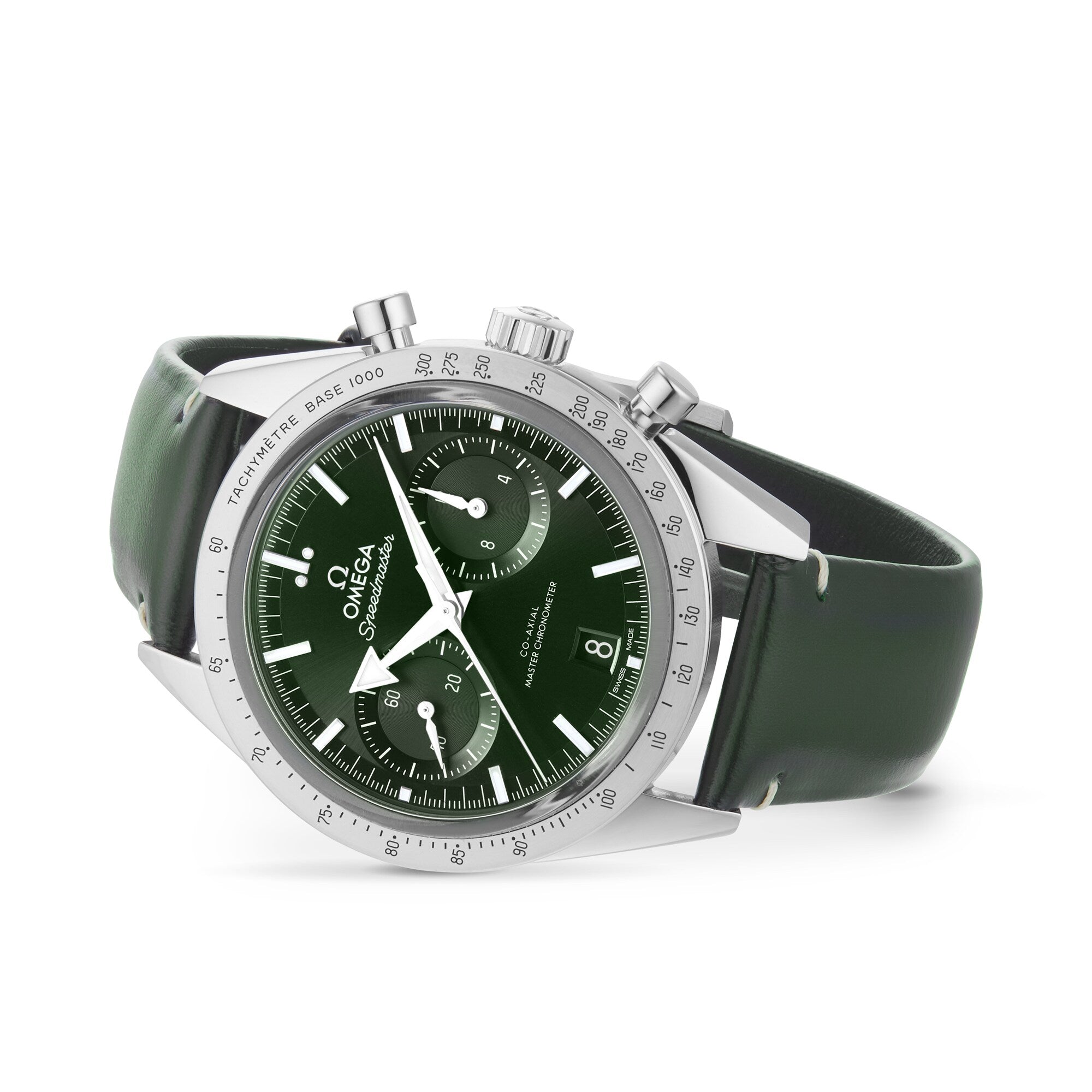 The OMEGA Speedmaster 57 is a green chronograph watch with a green leather strap, silver case, three subdials, date window at 6 o’clock, and advanced 9906 calibre movement, shown on a white background.
