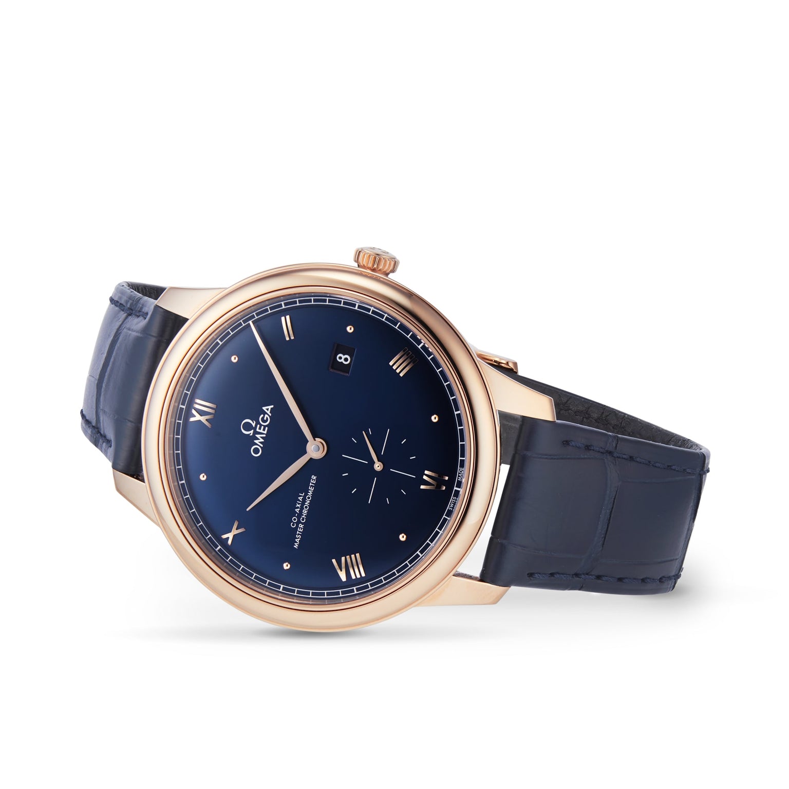 The OMEGA De Ville Prestige is a gold wristwatch featuring a blue leather strap, blue dial with Roman numerals, date window, small seconds subdial, and the Omega Master Co-Axial 8802 movement.