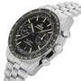 The OMEGA Speedmaster Super Racing is a stainless steel luxury wristwatch featuring a black honeycomb-patterned dial with yellow accents, three subdials, a tachymeter bezel, and a metal link bracelet.