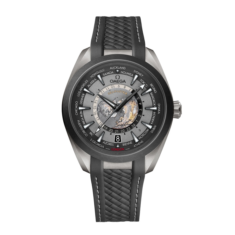 The OMEGA Seamaster Aqua Terra 150M features a titanium case, black rubber strap, gray and black bezel, world map dial with city names around the edge, and the OMEGA logo beneath 12 o’clock.