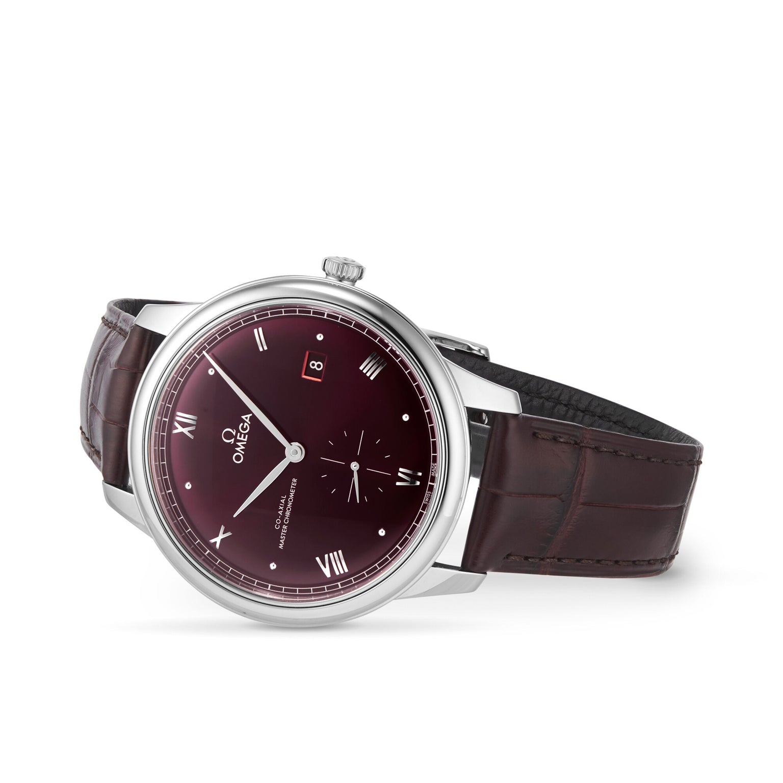 The OMEGA De Ville Prestige features a burgundy dial with silver Roman numerals, date window at 3 o’clock, brown leather strap, and is powered by the Master Co-Axial Calibre 8802 movement.