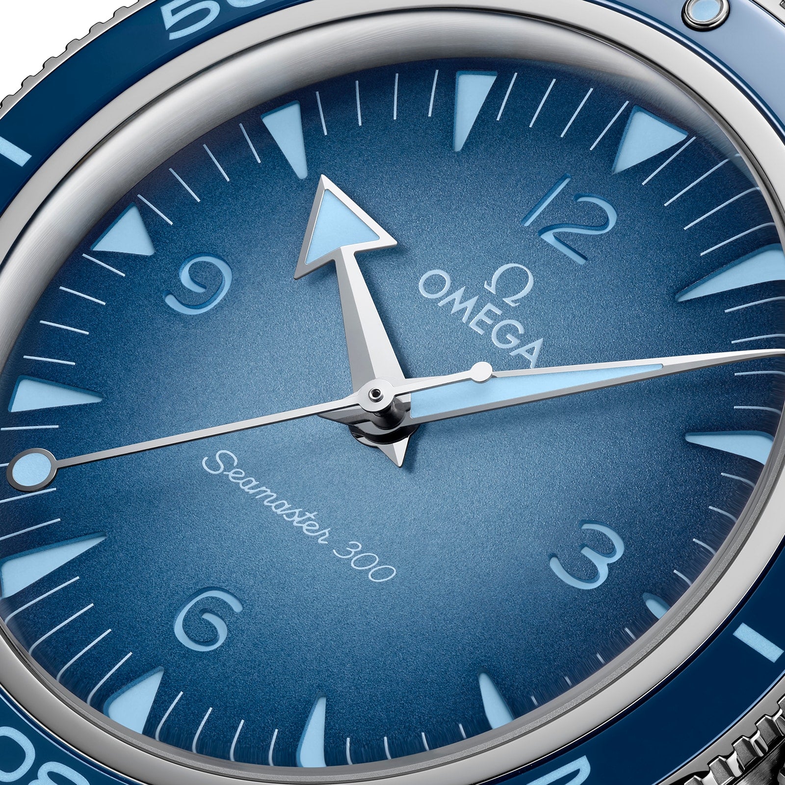 Close-up of the OMEGA Seamaster 300 Summer Blue, featuring a vibrant blue gradient dial, white hour markers, and silver hands, displaying the time at 10:09:38.
