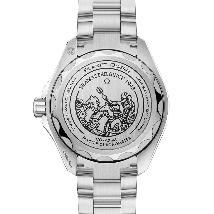 The back of the OMEGA Seamaster Planet Ocean 6000M features engraved text, a seahorse design, and specifications inspired by saturation divers watches for water resistance and chronometer certification.