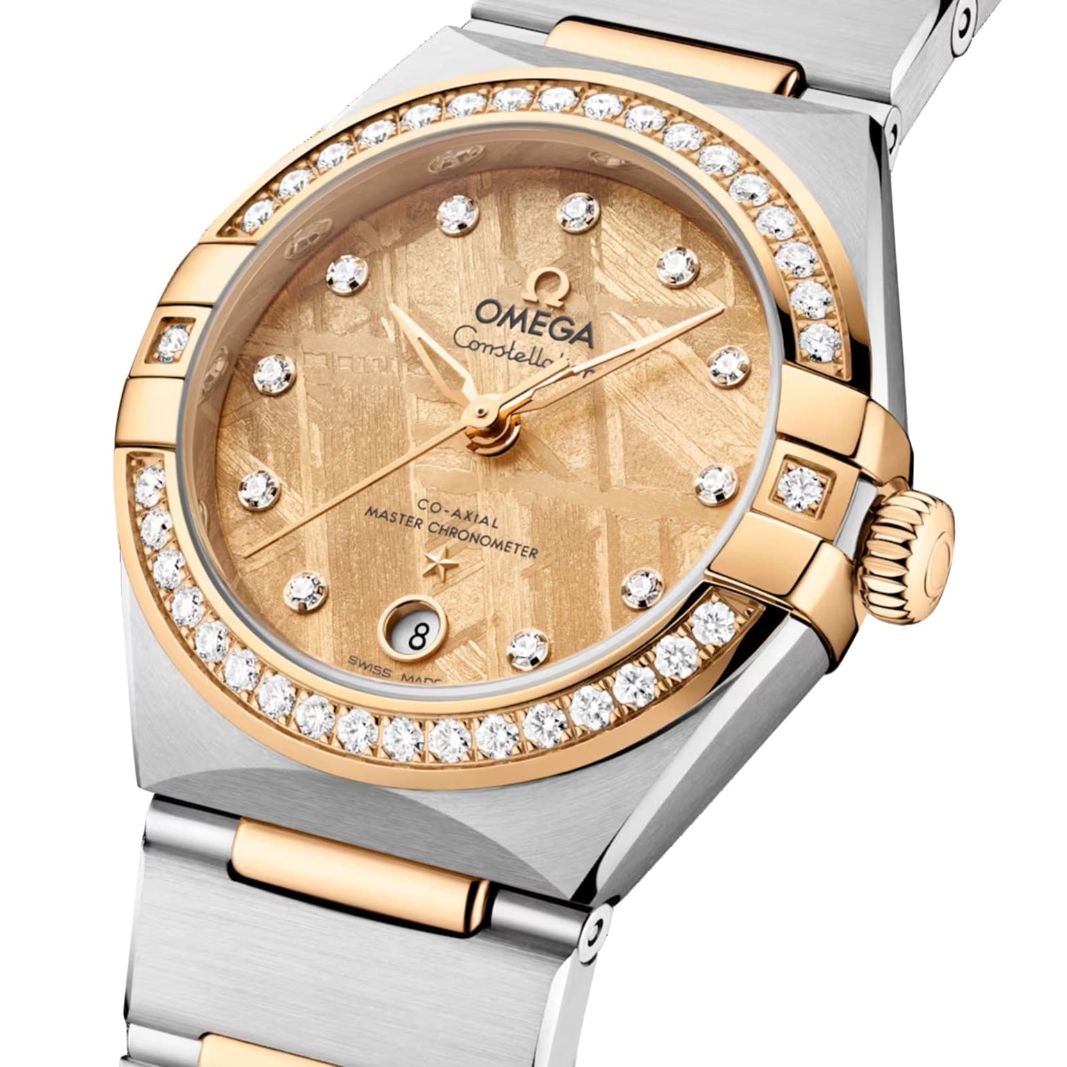 The OMEGA Constellation is a two-tone wristwatch with a gold and diamond-paved bezel, gold-patterned dial, diamond hour markers, 6 o’clock date window, and is powered by the Co-Axial Master Chronometer Calibre 8700.
