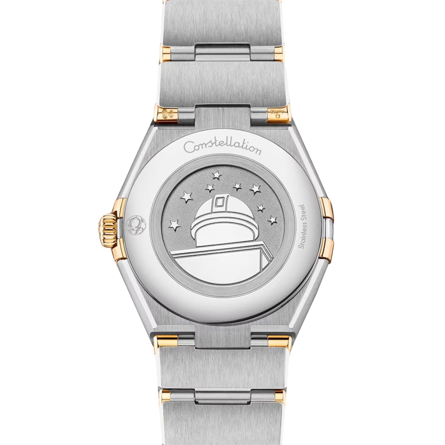 A close-up of the OMEGA Constellation’s caseback in stainless steel and 18K yellow gold, featuring the engraved observatory, stars, and Constellation inscription.