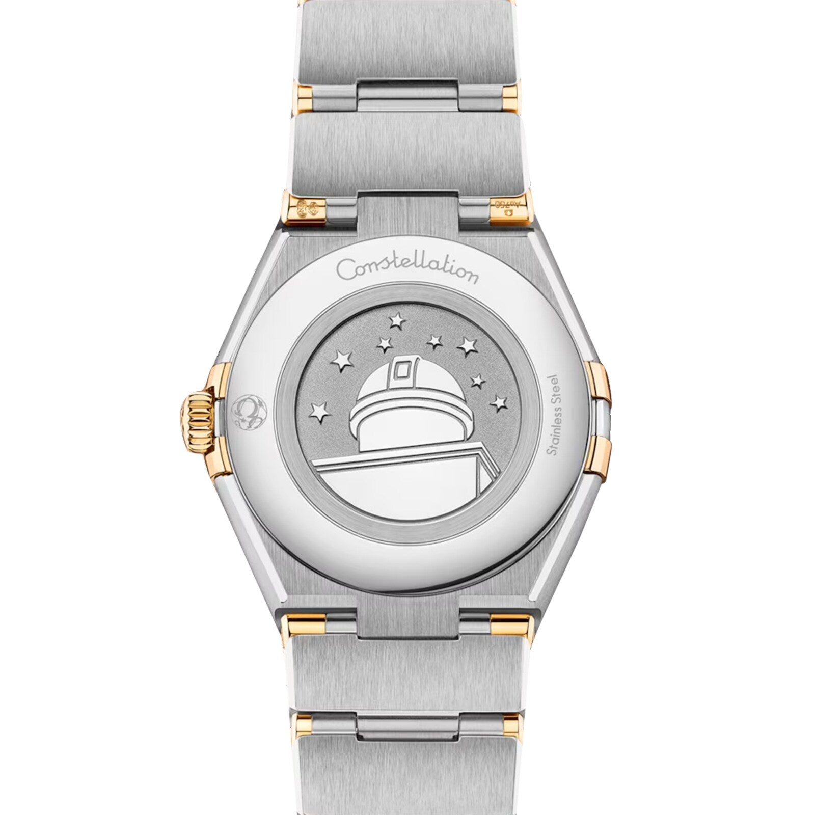 A close-up of the OMEGA Constellation’s caseback in stainless steel and 18K yellow gold, featuring the engraved observatory, stars, and Constellation inscription.