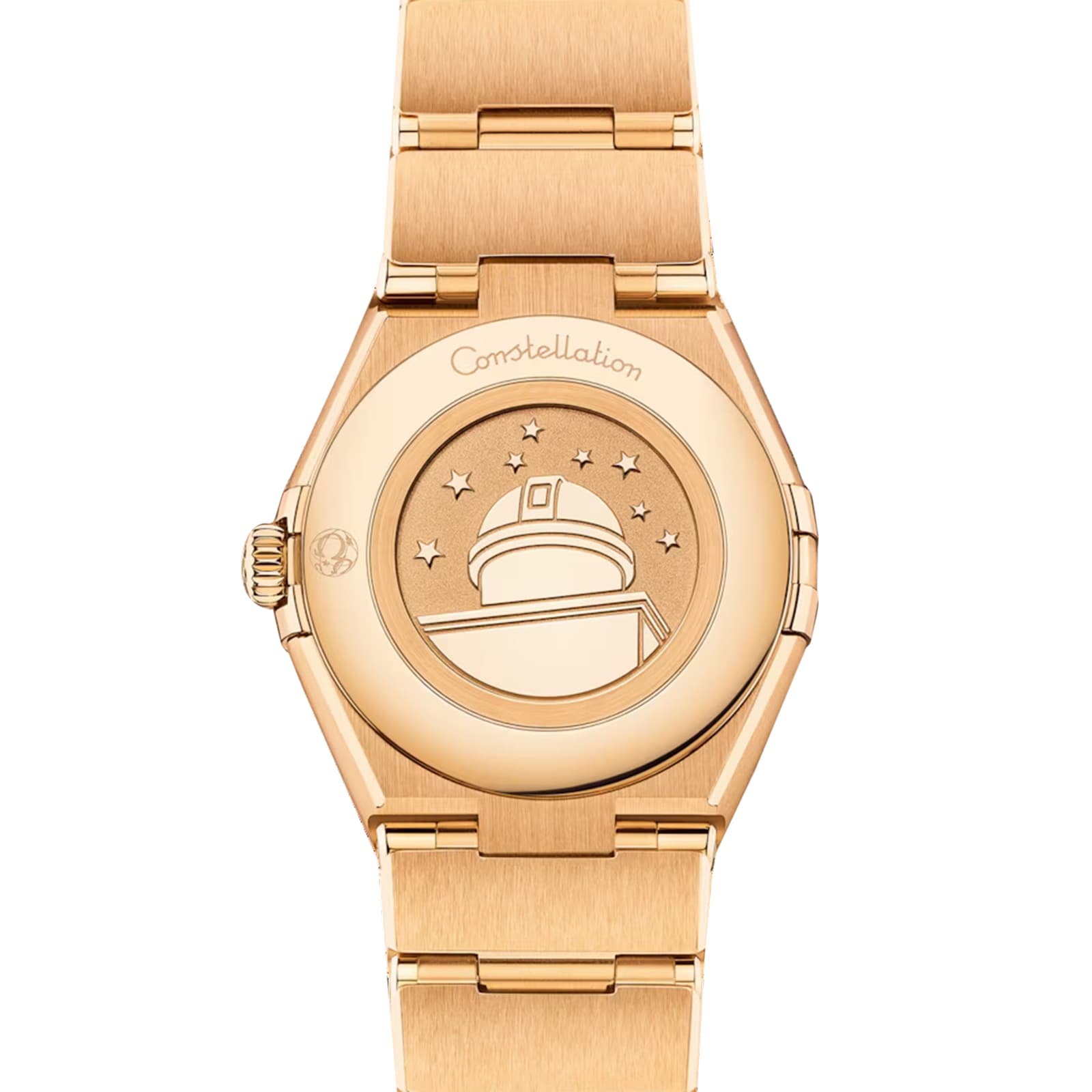 Close-up of the back of an OMEGA Constellation watch in 18K yellow gold, showing an engraved observatory with stars and Constellation inscribed above.