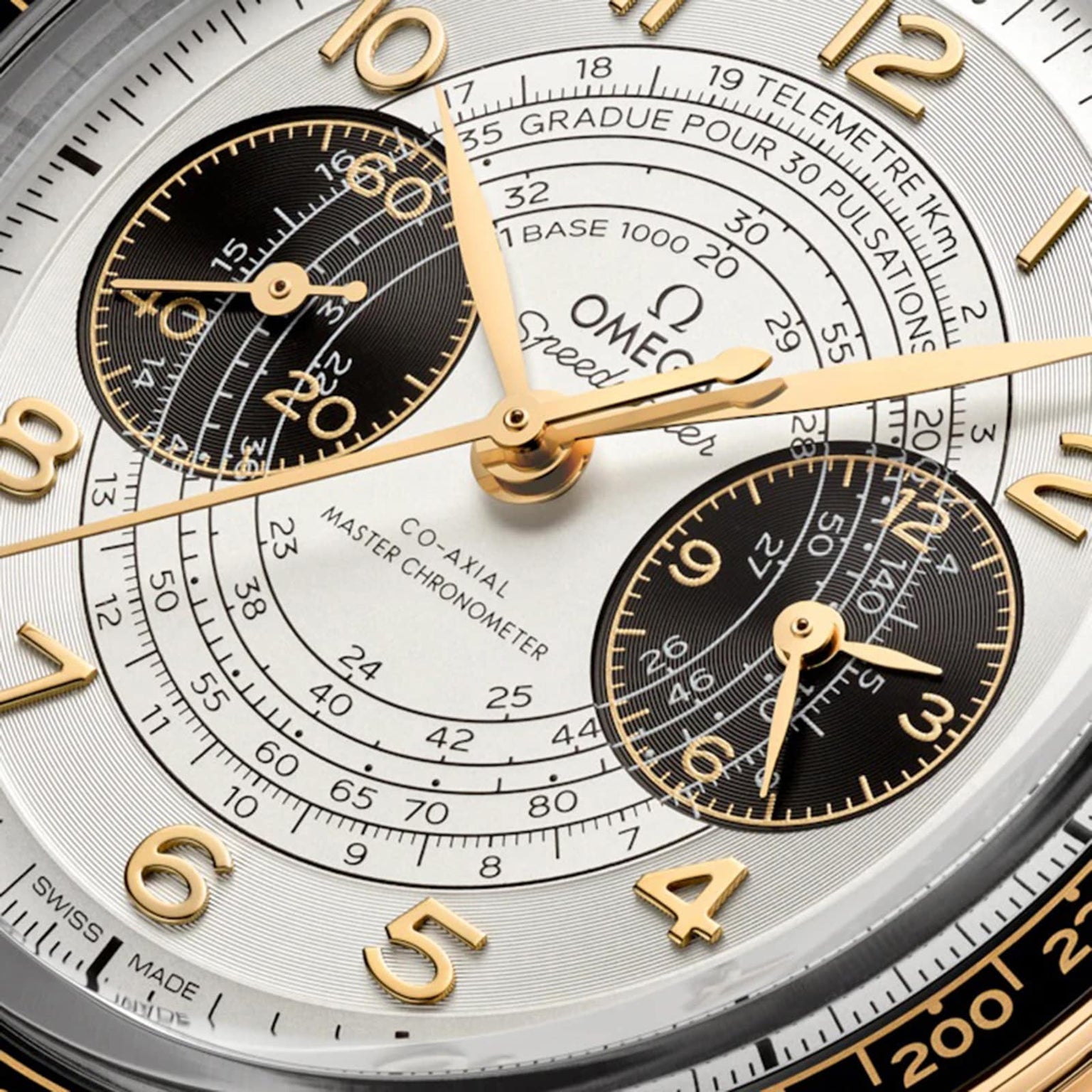 Close-up of the OMEGA Speedmaster Chronoscope Paris 2024 Olympics watch face, with gold numerals, chronograph subdials, and French calibration details—honoring OMEGA’s role as Official Timekeeper for the Paris 2024 Games.