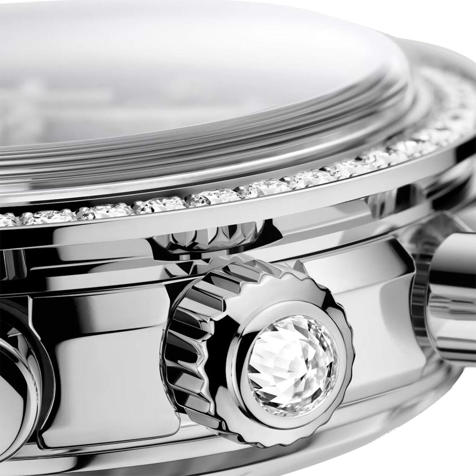 Close-up of the OMEGA Speedmaster 38 chronograph case, featuring a faceted crown, pushers, and a row of small diamonds set around the bezel.
