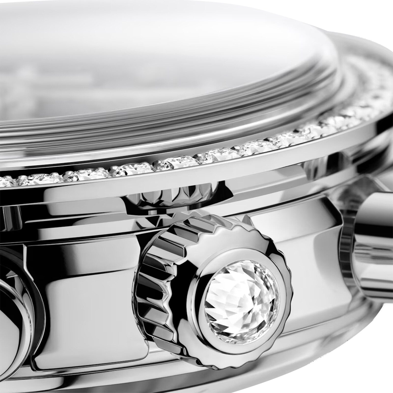 Close-up of the OMEGA Speedmaster 38 chronograph case, featuring a faceted crown, pushers, and a row of small diamonds set around the bezel.