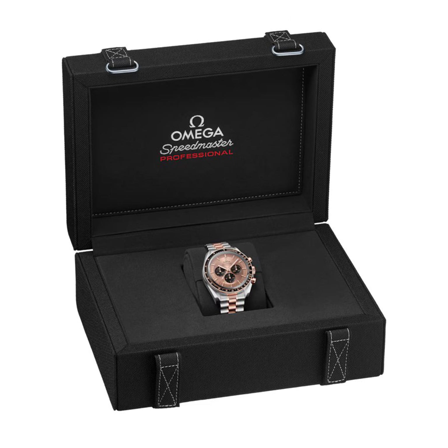 An OMEGA Speedmaster Moonwatch Professional Sedna wristwatch with a metal band is presented in an open black box, featuring the OMEGA logo and branding inside the lid—a remarkable timepiece.