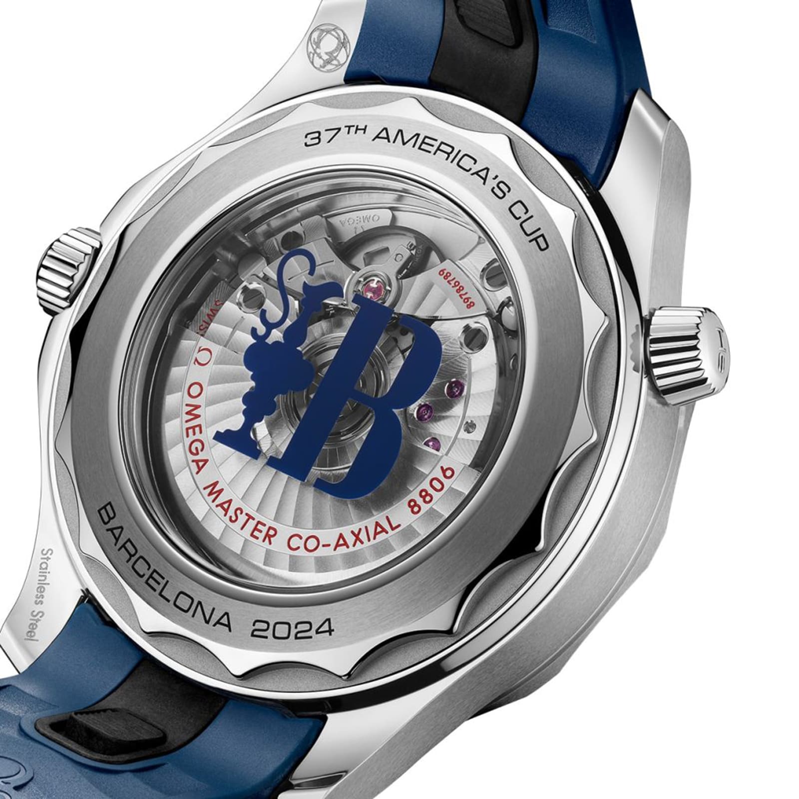 Close-up of the back of the OMEGA Seamaster Diver Americas Cup 300M, showing the 37th Americas Cup Barcelona 2024 engraving, visible inner mechanism, and Co-Axial Master Chronometer Calibre 8806.