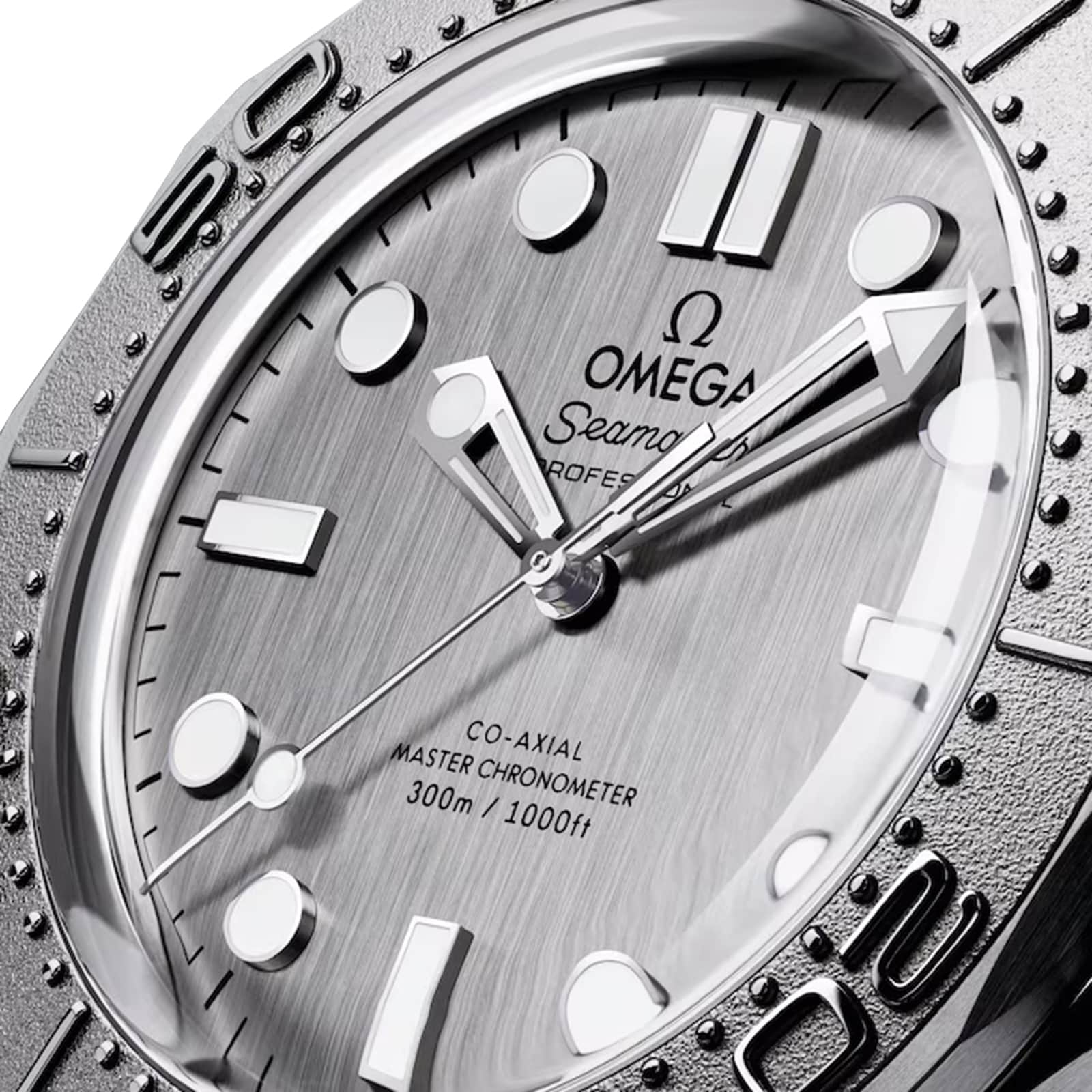 Close-up of the OMEGA Seamaster Diver 300M watch face, featuring hour markers, hands, logo, OMEGA Co-Axial Master Chronometer text, and 300m/1000ft water resistance.