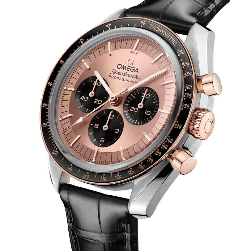 A close-up of an OMEGA Speedmaster Moonwatch featuring a rose gold dial, black subdials, tachymeter bezel, and a black leather strap.