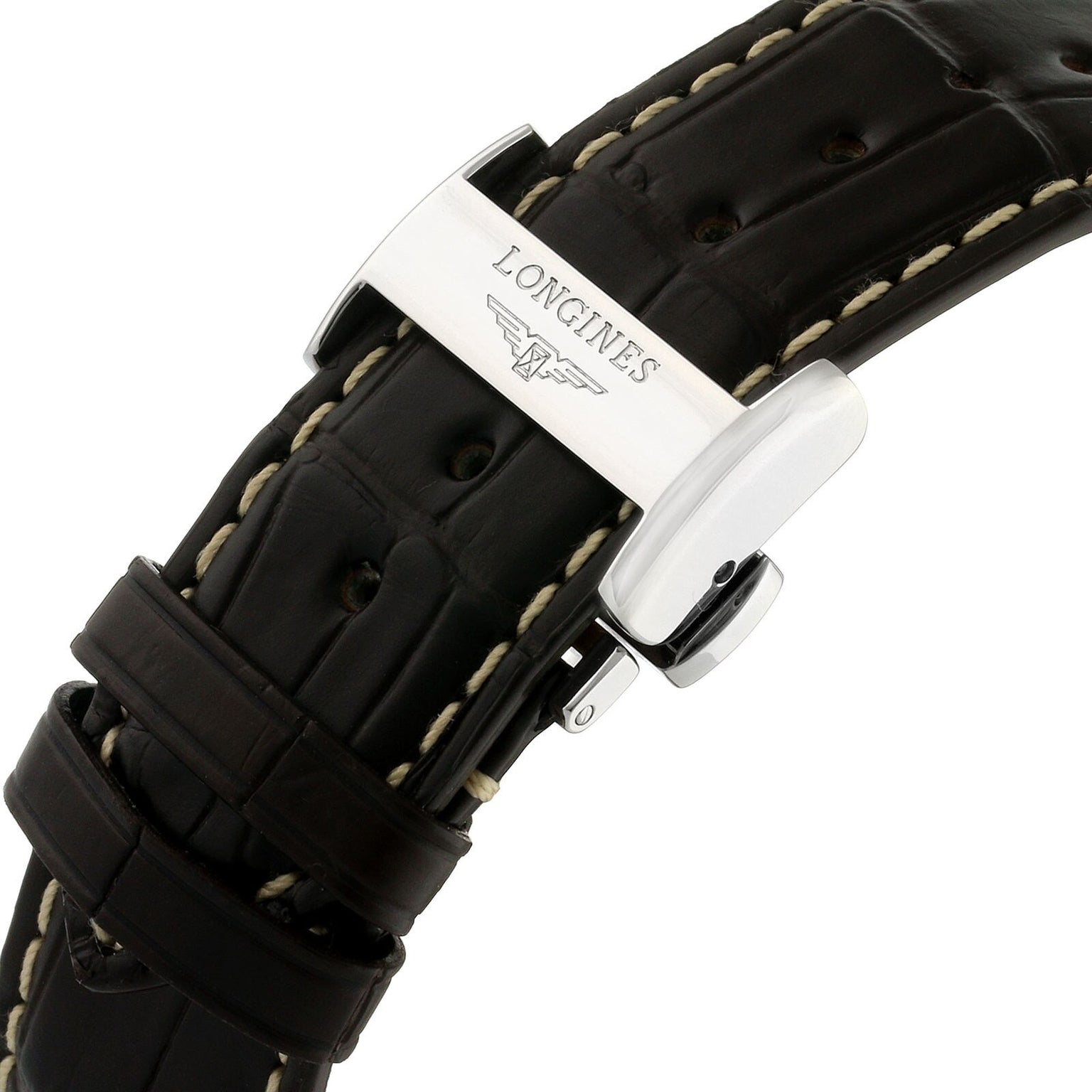 Close-up of a brown leather strap with white stitching and a silver Longines clasp—an elegant detail from the Master Collection Chronograph, renowned for vintage charm.