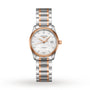 The Longines Master Collection ladies’ watch features a silver and rose gold band, white dial with gold hands, diamond hour markers, date display at 3 o’clock, and precision automatic movement.