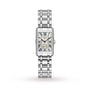 The Longines DolceVita is a rectangular silver women’s watch with a metal link band, Roman numeral markers, blue hands, diamond-accented sides, and a small seconds subdial—embodying Italian-inspired elegance.
