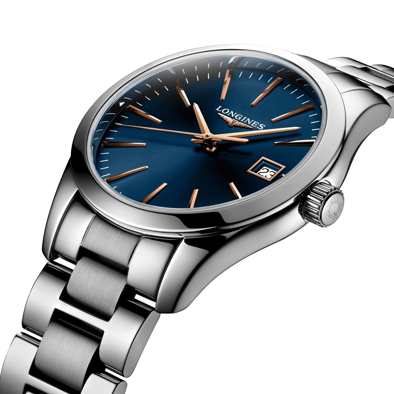 The Longines Conquest Classic is a stainless steel wristwatch featuring a blue dial, gold hour markers and hands, a date window at 3 o’clock, and a metal bracelet.