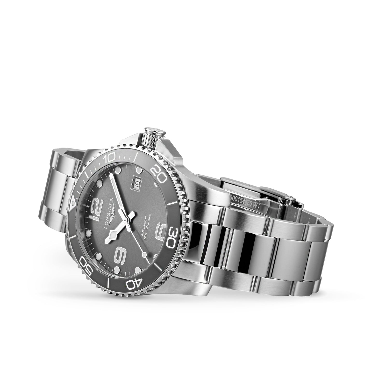 A Longines HydroConquest diving watch with a stainless steel case, black rotating bezel, silver markers, and date display is displayed with its metal band partially unfastened on a white background.