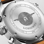 Close-up of a Longines Spirit Chronograph case back displays an engraved globe logo, SWISS MADE text, serial and model numbers, water resistance, ALL STAINLESS STEEL SPIRIT, and houses the chronometer-certified L688.4 calibre movement.
