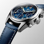 Close-up of the Longines Spirit Chronograph, showcasing its 42mm stainless steel case, blue dial with three subdials, and a blue leather strap accented with white stitching.