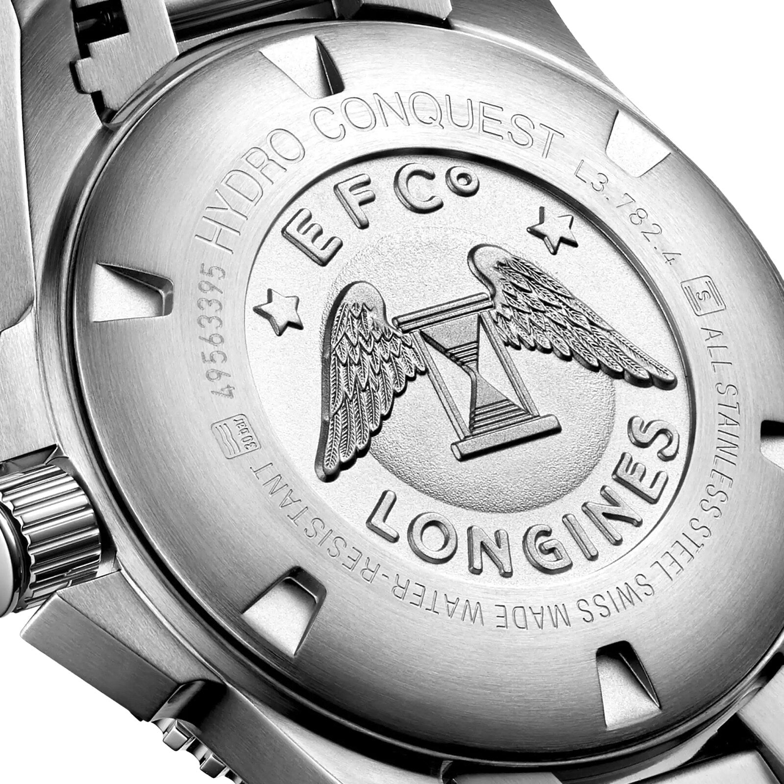 Close-up of the Longines HydroConquest’s caseback, showcasing engraved logos, text, and the iconic winged hourglass emblem on stainless steel—a signature feature of Longines dive watches.