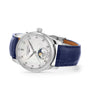 The Longines Master Collection Moonphase features a silver case, blue leather strap, diamond indexes, and a moonphase display on a white dial, elegantly displayed at an angle against a white background.