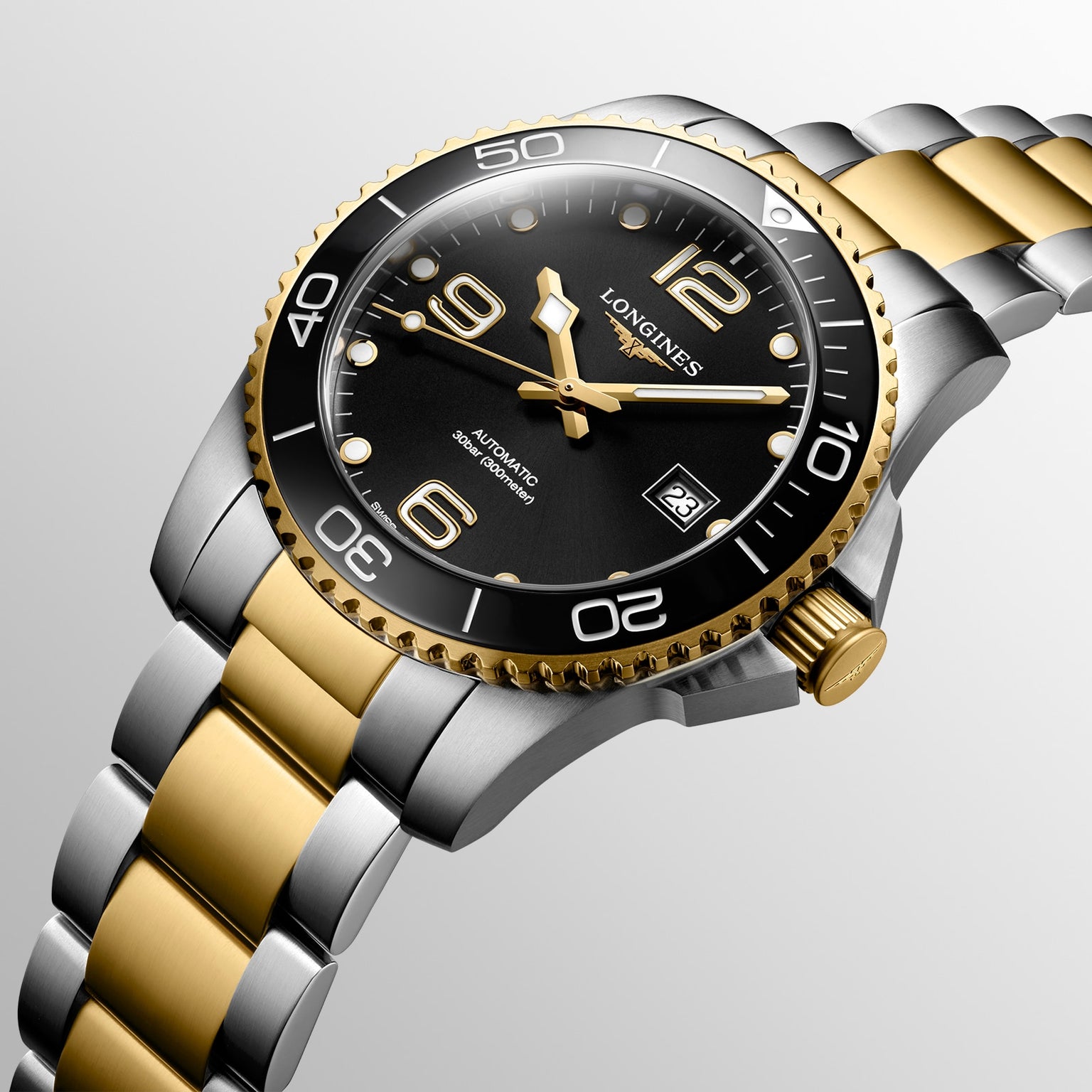 The Longines HydroConquest is a two-tone stainless steel and gold diving watch with a black bezel, black dial featuring gold accents, date at 3 o’clock, and outstanding water resistance.