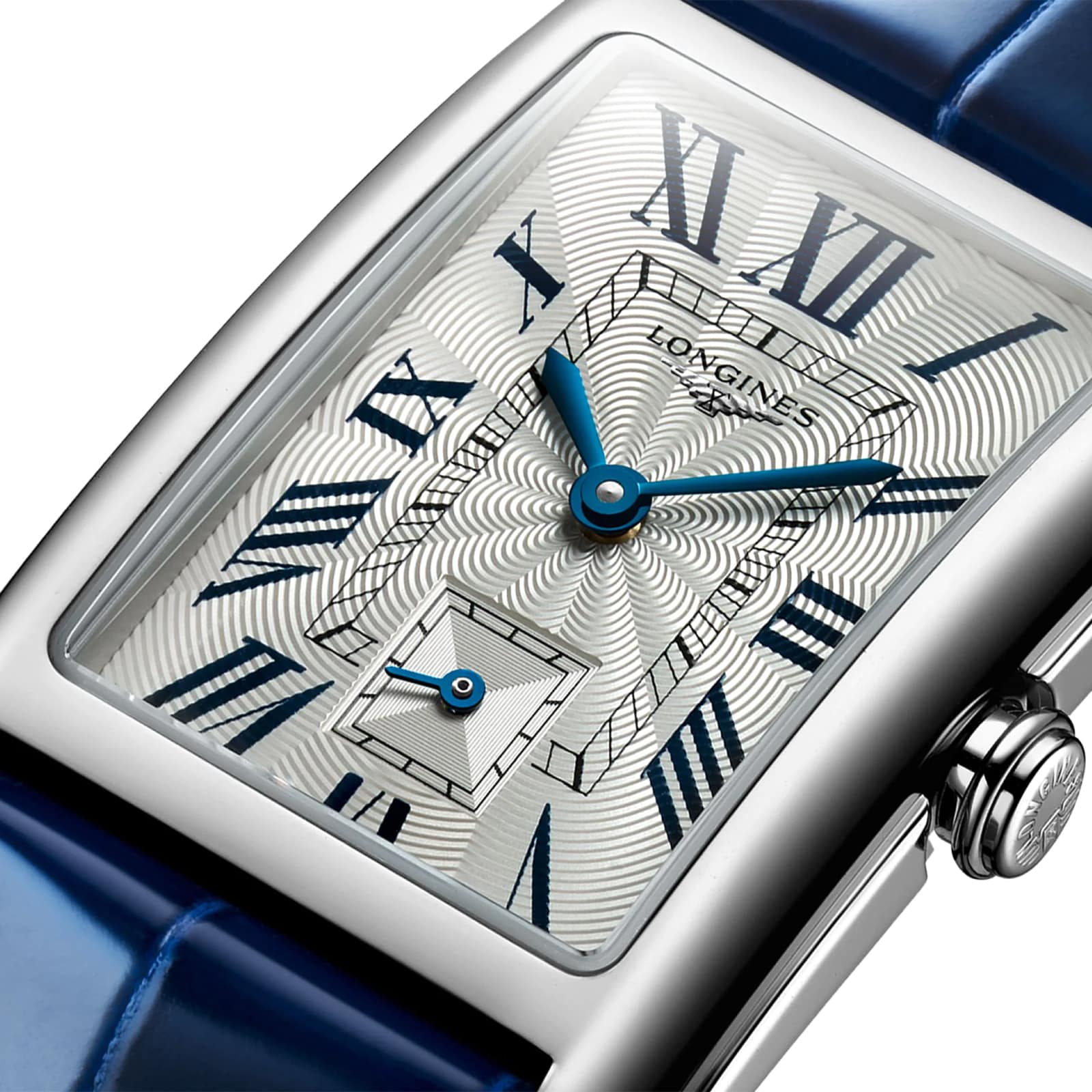 Close-up of a Longines DolceVita watch with a stainless steel case, patterned dial, blue Roman numerals and hands, and a blue leather strap.