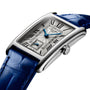 The Longines DolceVita wristwatch showcases a rectangular stainless steel case, patterned dial with Roman numerals, blue hands, and a blue leather strap.