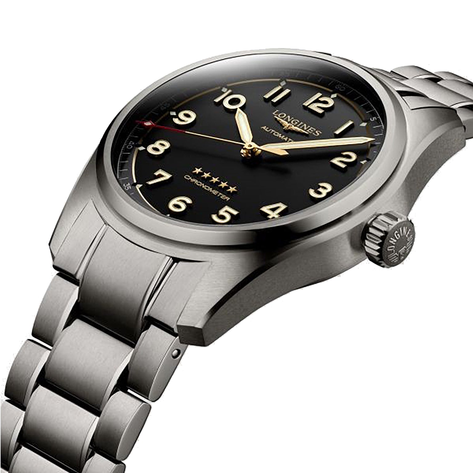 The Longines Spirit features a stainless steel case, black dial with gold numerals and hands, metal bracelet, and a prominent winding crown on the right.