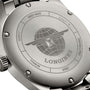 Close-up of the back case of the Longines Spirit watch, featuring the brand logo, an engraved globe, and inscriptions like Swiss Made, Titanium, and serial numbers.