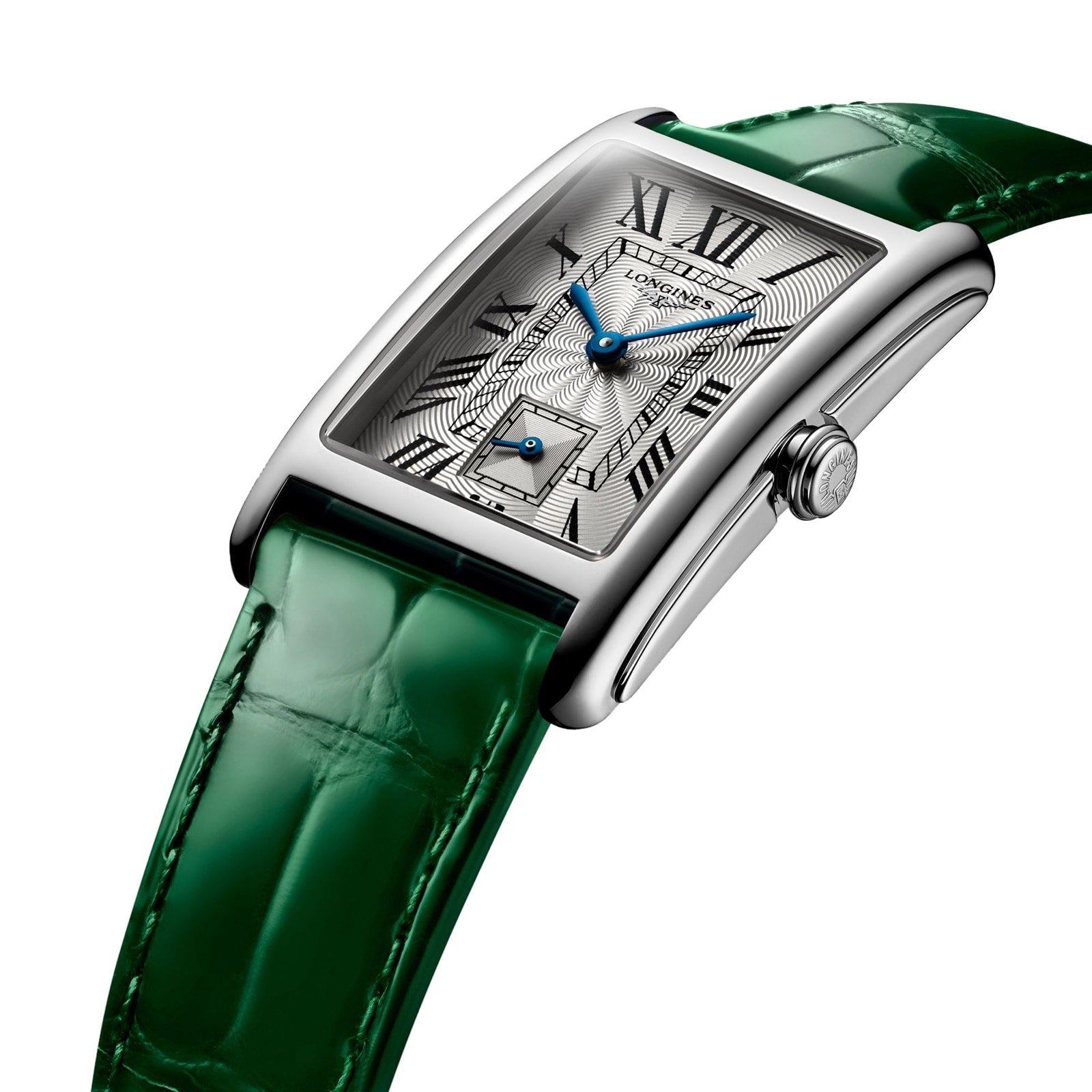 The Longines DolceVita, a rectangular silver watch with a patterned dial, Roman numerals, and a green leather strap, is shown at an angle.