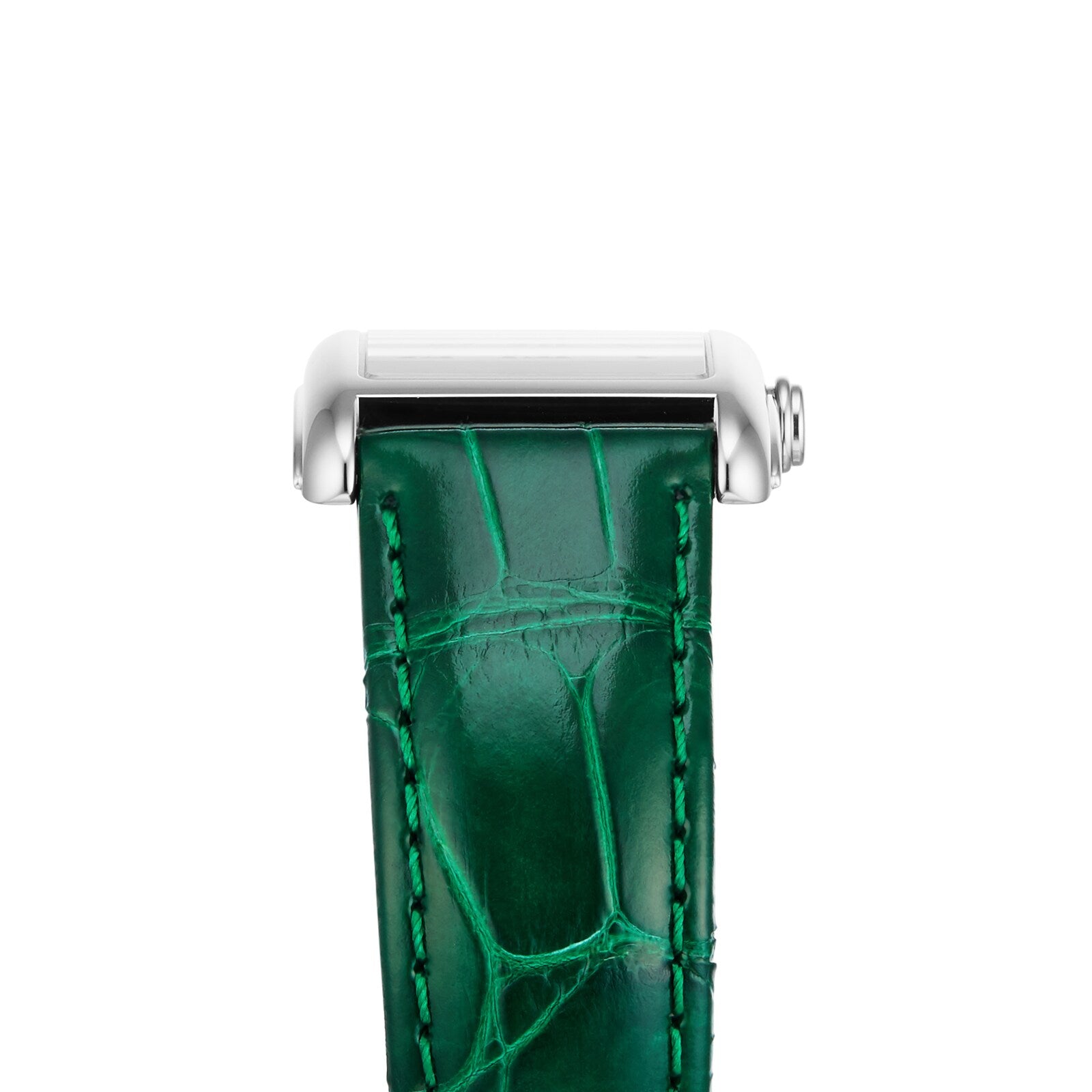 Close-up of a silver rectangular Longines DolceVita watch case with a green leather strap in crocodile pattern. The face is not shown, but this DolceVita model by Longines runs on a precise quartz movement.