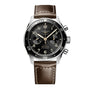 The Longines Spirit Flyback wristwatch features a brown leather strap, black dial, and chronograph subdials.