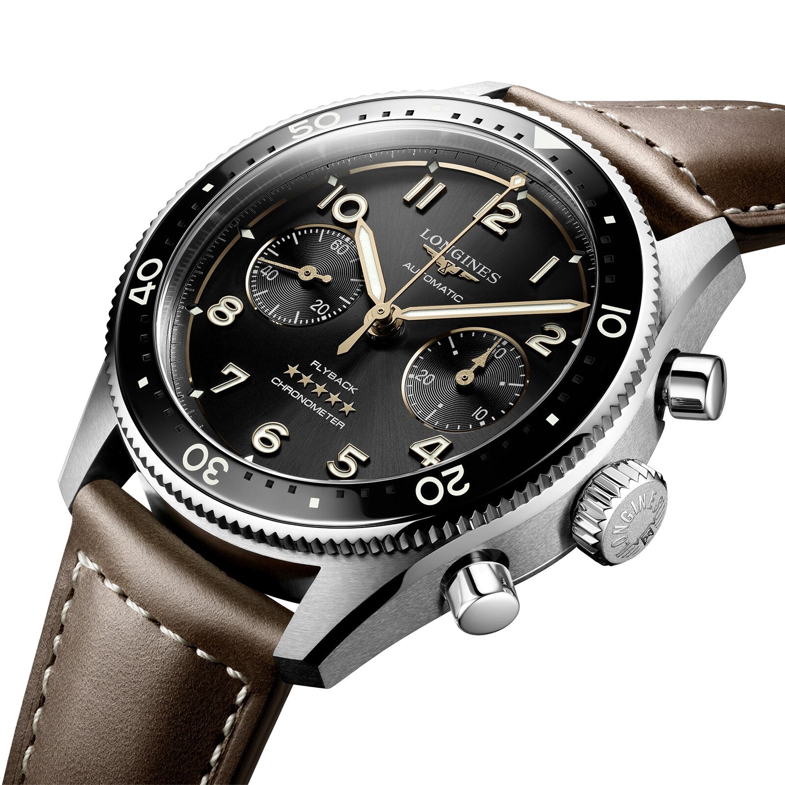 A close-up of the Longines Spirit Flyback chronograph wristwatch featuring a black dial, beige numerals, three subdials, rotating bezel, brown leather strap, and powered by the automatic calibre L791 with COSC certification.