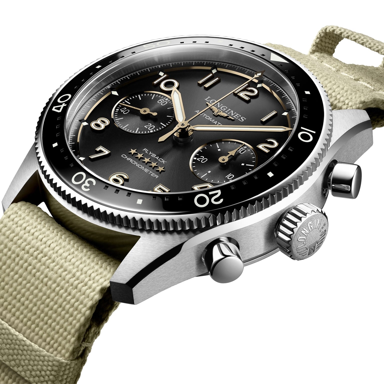 Close-up of the Longines Spirit Flyback chronograph featuring a black dial, beige numerals and subdials, a beige fabric strap, and precise chronometer performance with automatic calibre L791.