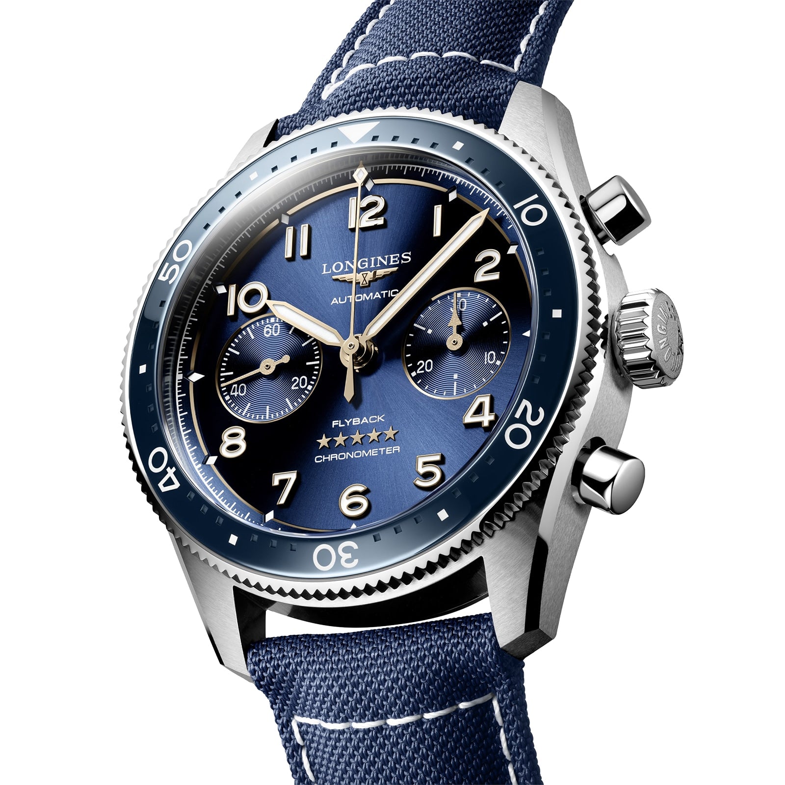 A close-up of the Longines Spirit Flyback, an automatic chronograph with a blue dial, two subdials, blue fabric strap, and stainless steel case.
