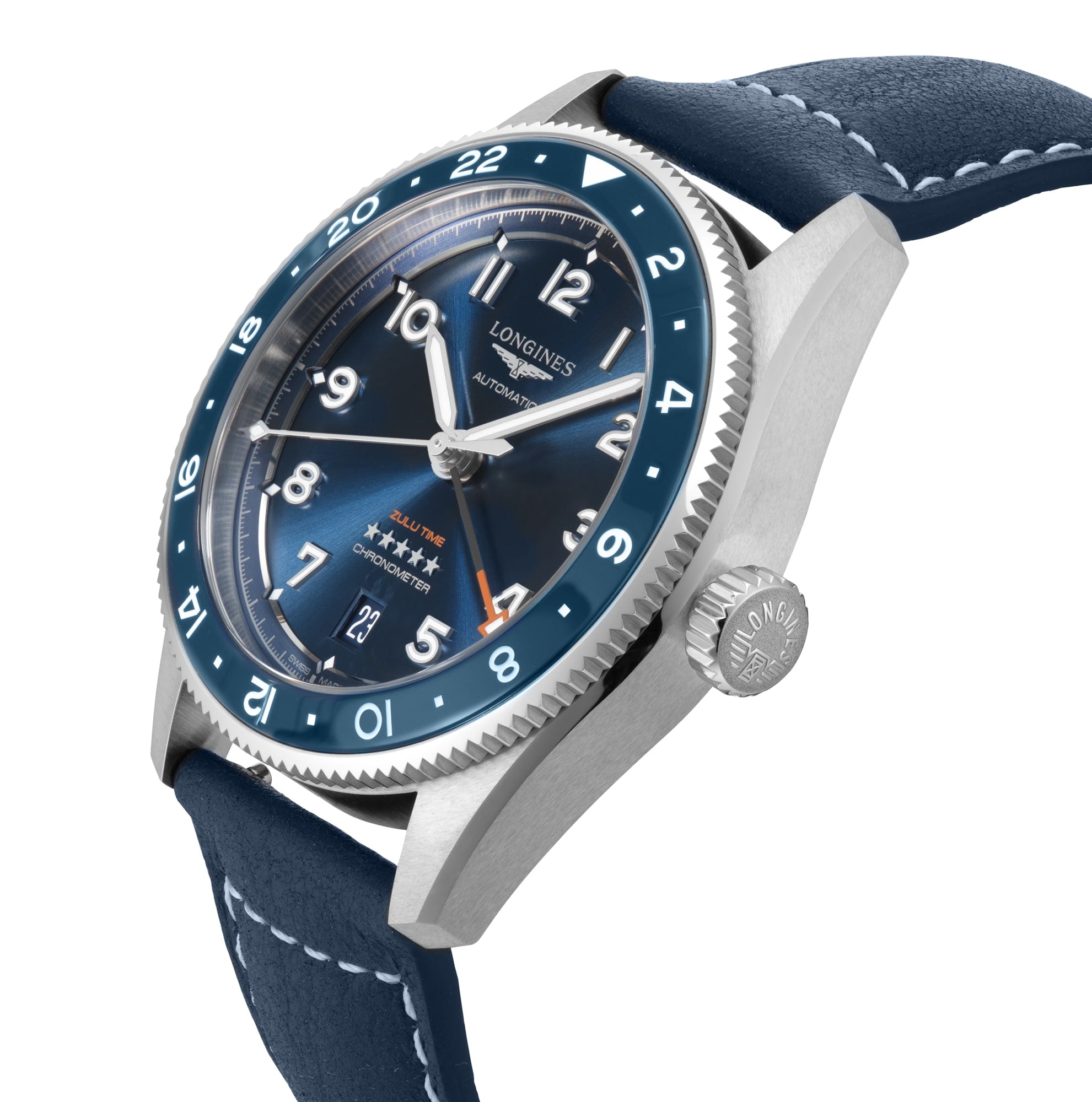 The Longines Spirit Zulu Time features a blue dial, stainless steel case, blue leather strap, white numerals, date at 3 o’clock, and a rotating 24-hour bezel for tracking multiple time zones.