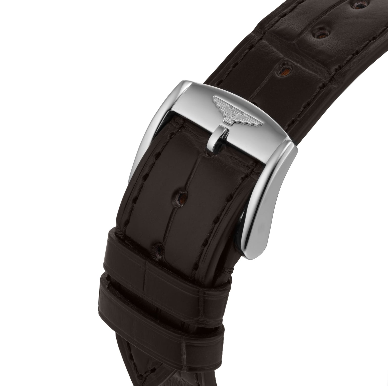 Close-up of a black leather strap with silver buckle, featuring an embossed winged logo—capturing the innovative spirit of the Longines Flagship Heritage Moonphase.