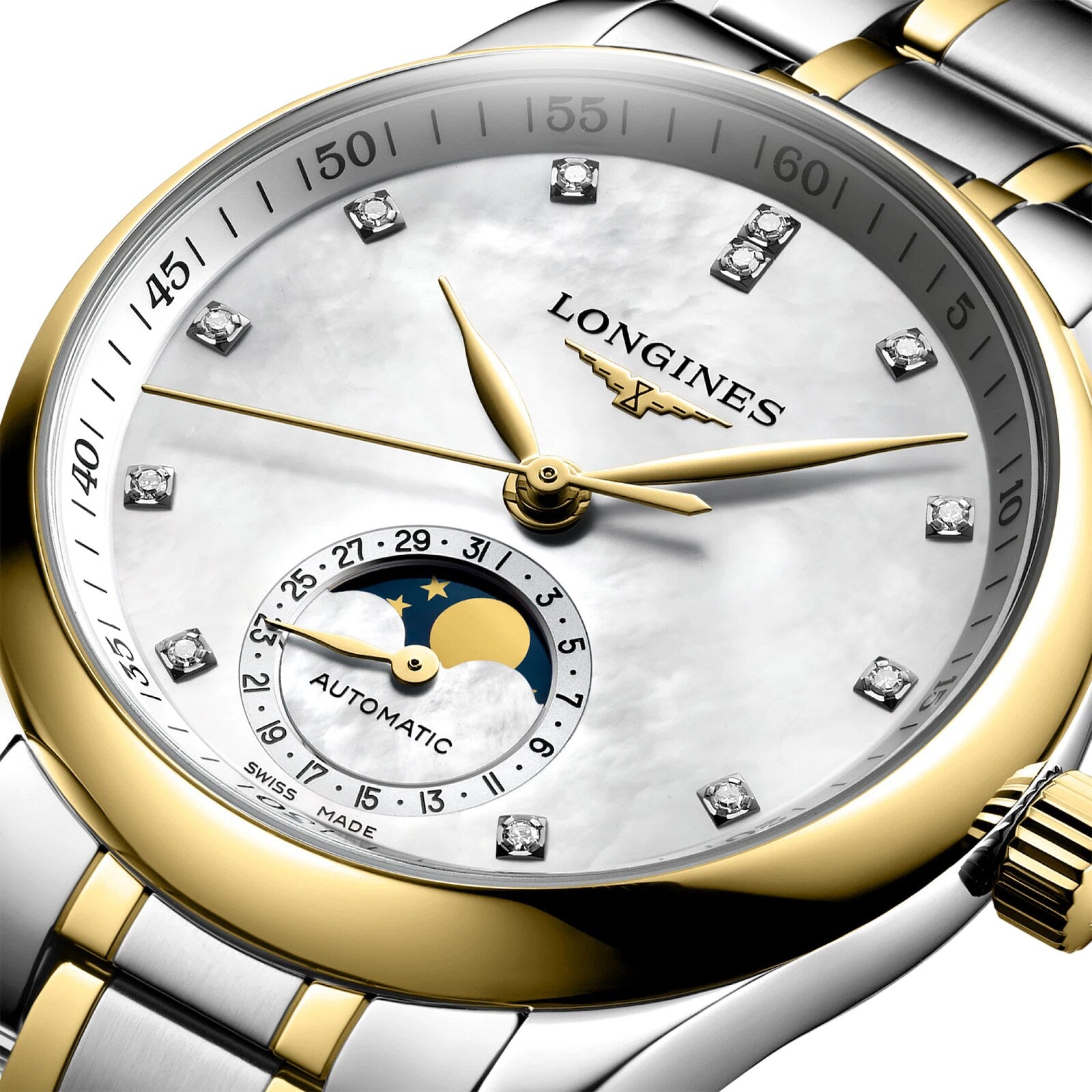 Close-up of the Longines Master Collection Moonphase wristwatch, featuring a gold and silver band, diamond hour markers, a moonphase subdial, and Automatic text.