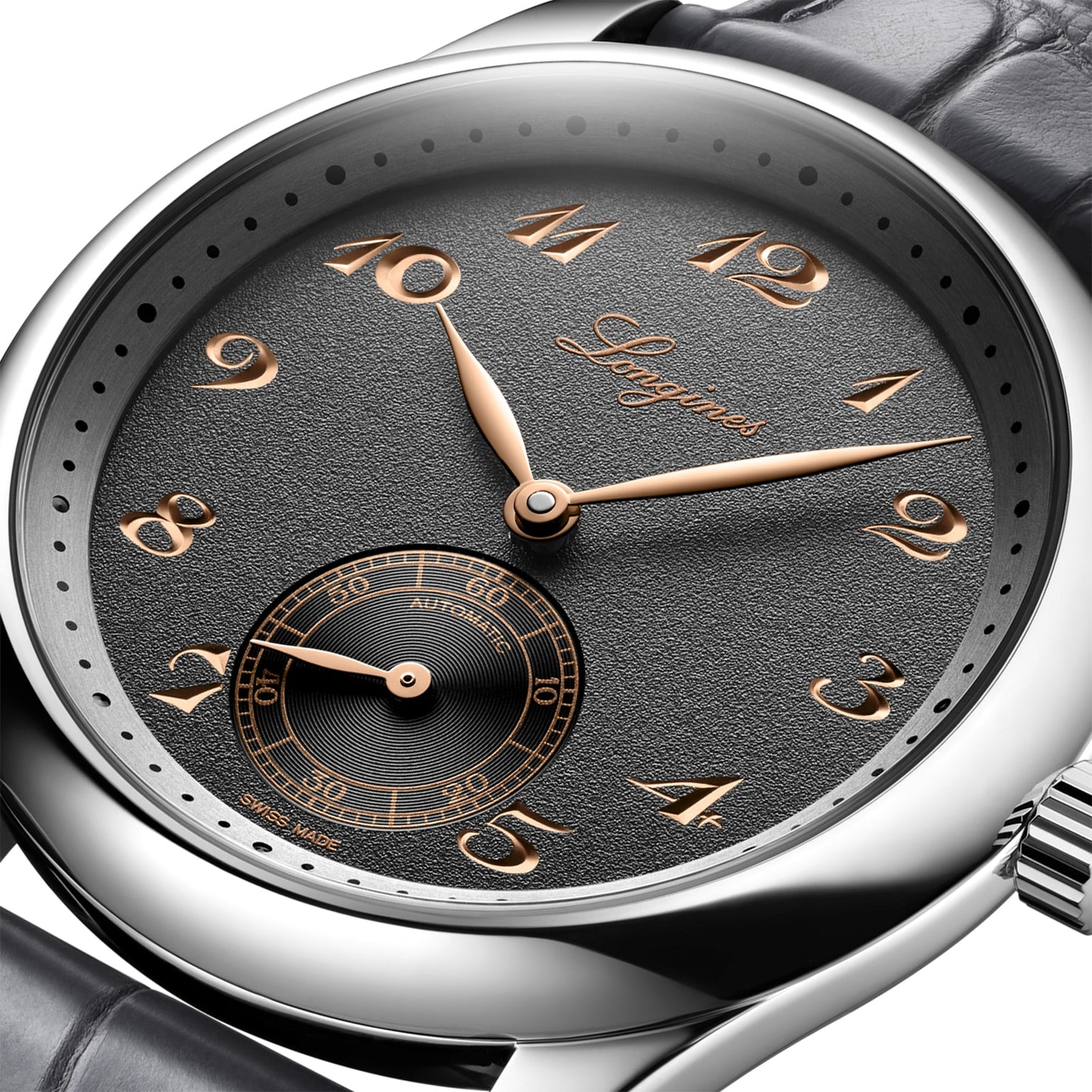 Close-up of a Longines Master Collection wristwatch with an anthracite dial, gold Arabic numerals and hands, subdial at 6 o’clock, L893 automatic movement, and a black leather strap.