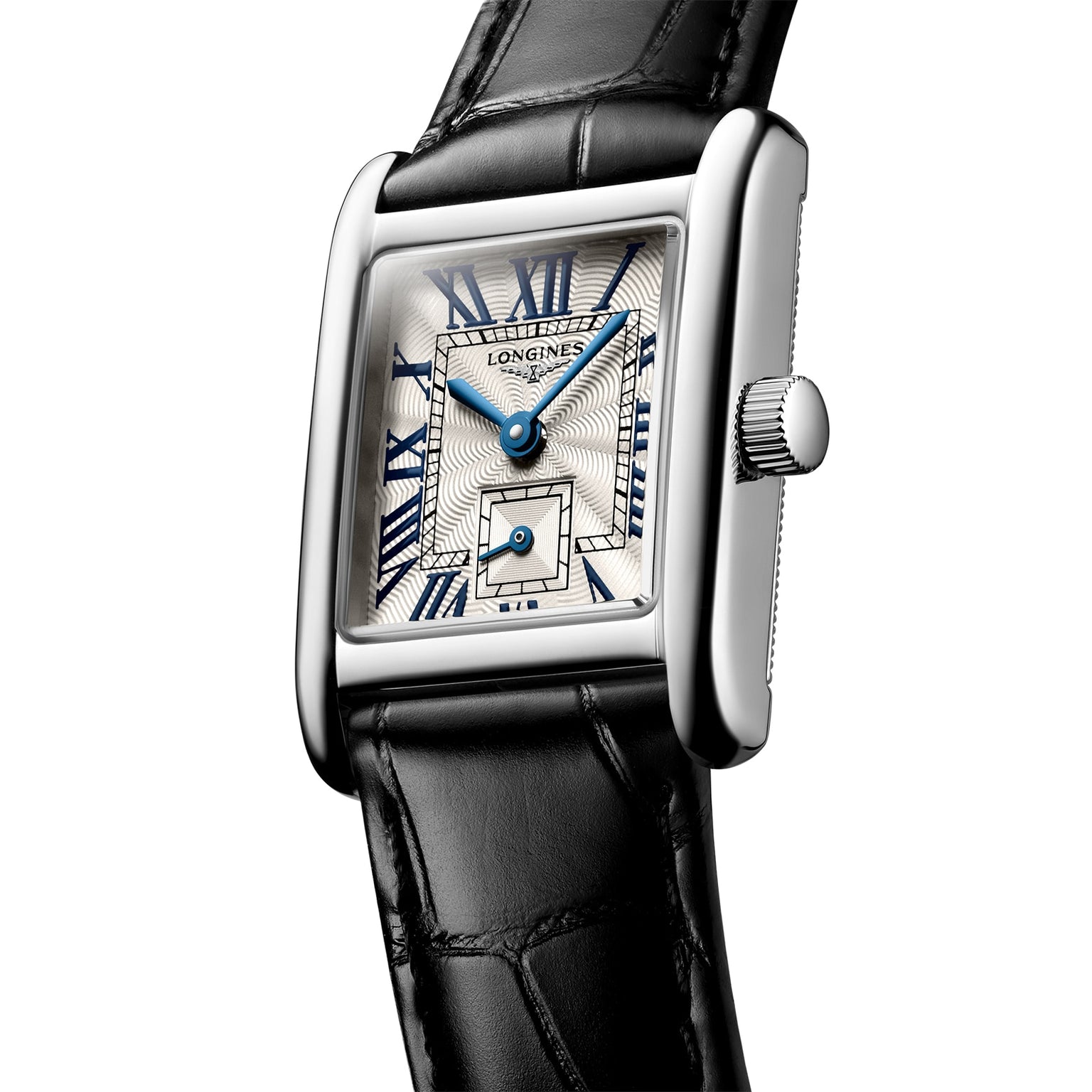 The Longines Mini DolceVita features a rectangular stainless steel case, white dial with blue hands, Roman numerals, small seconds subdial, and a black leather strap topped with sapphire crystal.