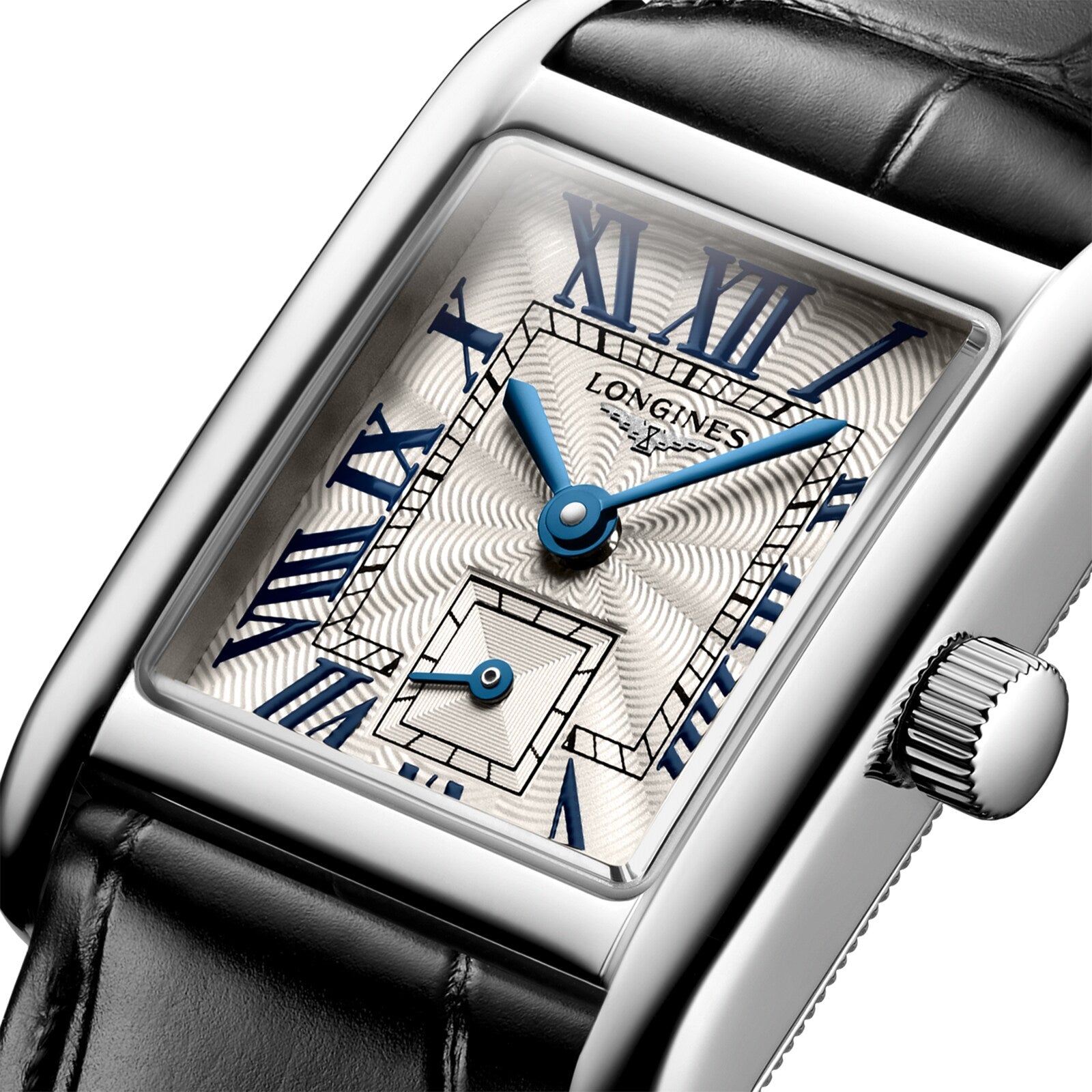 Close-up of the Longines Mini DolceVita wristwatch with a rectangular stainless steel case, silver dial, blue Roman numerals and hands, small seconds sub-dial, sapphire crystal, and black leather strap.
