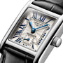 Close-up of the Longines Mini DolceVita wristwatch with a rectangular stainless steel case, silver dial, blue Roman numerals and hands, small seconds sub-dial, sapphire crystal, and black leather strap.