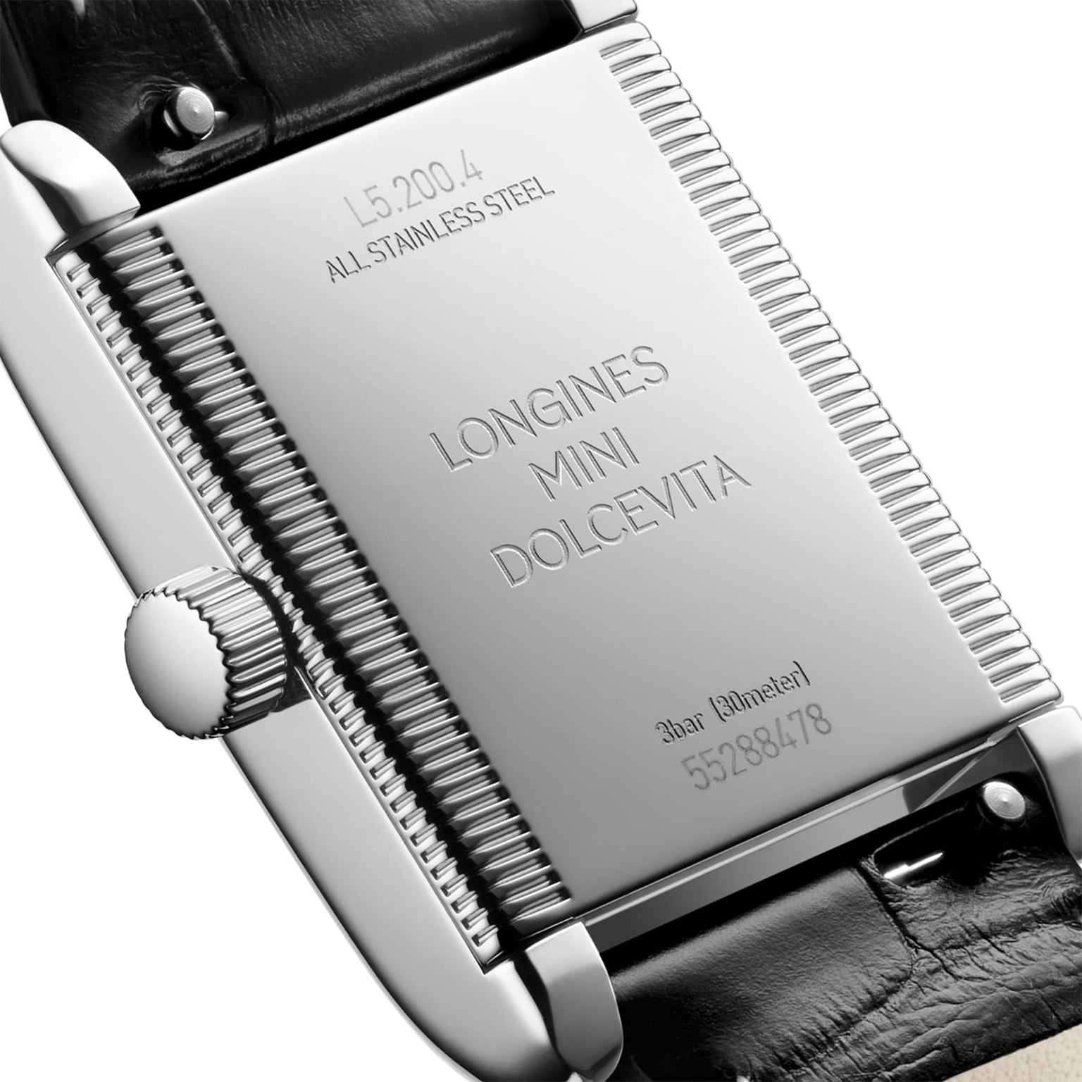 Close-up of the Longines Mini DolceVita’s polished rectangular stainless steel case back, engraved with model details, water resistance, serial number, and sapphire crystal marking.