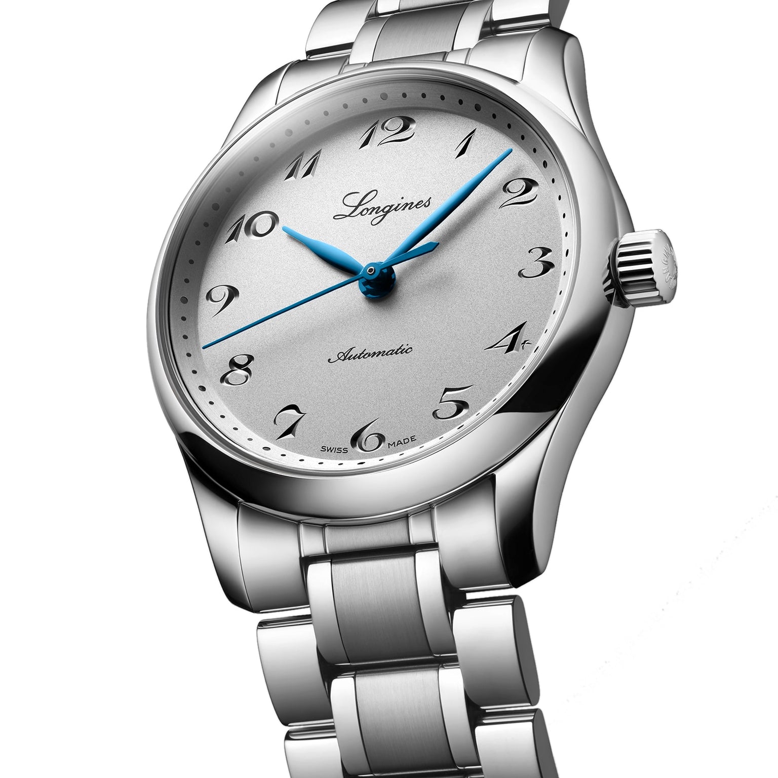 The Longines Master Collection silver wristwatch features automatic movement, blue hands, black numerals, and a metal link band, displayed at an angle on a white background.
