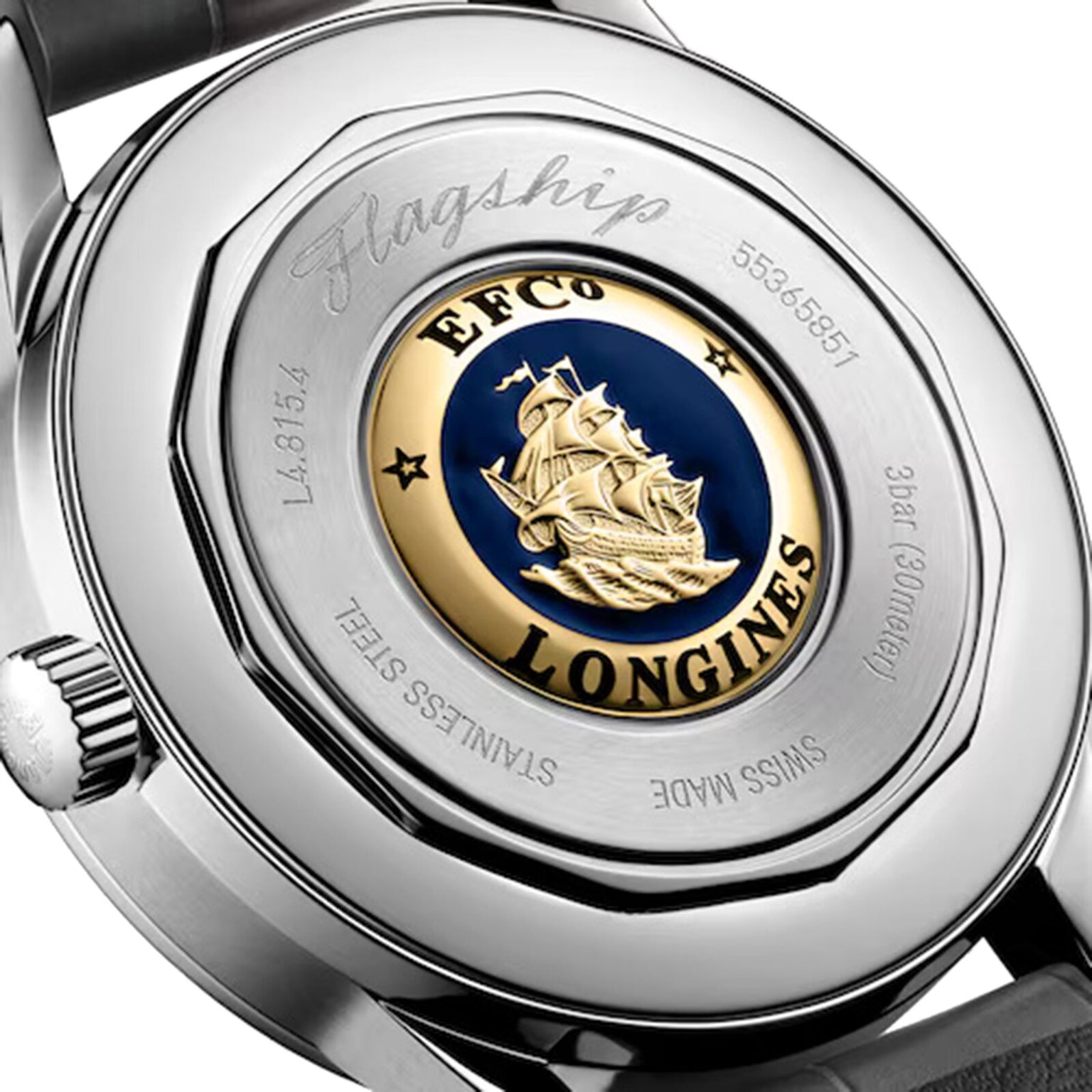 Close-up of the Longines Flagship Heritage Moonphase case back, showing an engraved ship emblem, EFCO LONGINES, model numbers, Stainless Steel, and Swiss Made.